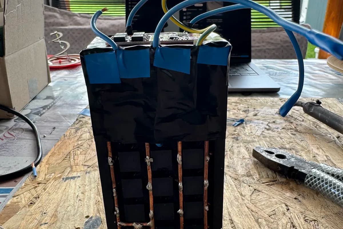assembled battery bank with visible copper connections and wiring
